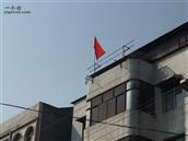普济村 这是我们普济镇集镇上唯一的一面国庆节国旗，而且还是一家私宅上的。