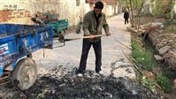 西郝村 党支部书记村委主任带领村民打扫卫生