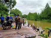 前屋村 20200709部队官兵，各级地方干群在大塘洲堤坝抗洪抢险。