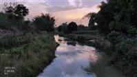 上游社区 夕阳下的河流